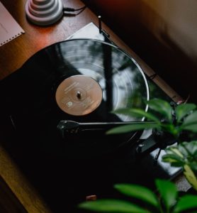 Photo of a Turn Table With A Vinyl Record On It To Show How Much I Love Music