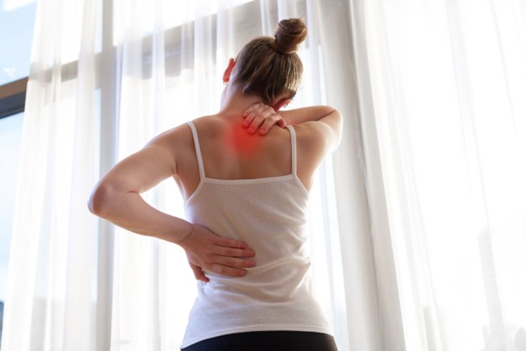 Photo Showing inflammation and Pain In Woman's Back